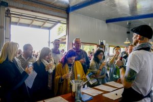 A group enjoying a wine tasting at Two FIgs Winery on a Wollongong Wine Tour