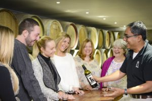 A group enjoying a wine tasting at Silos Estate in Berry on a Wollongong Wine Tour