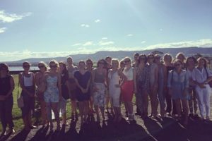 A photo of a group of girls on a hens day at Two Figs winery with the shoalhaven river in the background